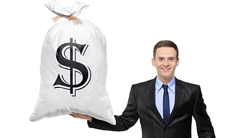 Full length portrait of a happy businessman holding a bag with