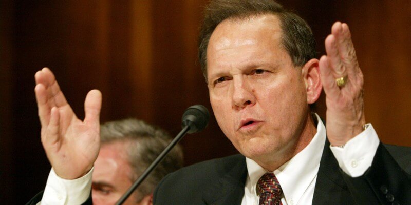 WASHINGTON - JUNE 8:  Roy Moore, former Chief Justice of The Alabama Supreme Court, testifies at a Senate Constitution, Civil Rights and Property Rights Subcommittee hearing, entitled "Beyond the Pledge of Allegiance: Hostility to Religious Expression in the Public Square." on Capitol Hill in Washington, DC  June 8, 2004. Moore was removed from office for refusing to take down a public display of the Ten Commandments in the courthouse.  (Photo by Matthew Cavanaugh/Getty Images)