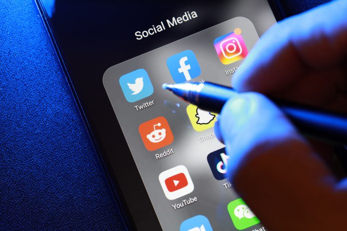 Penang,,Malaysia,-,Feb,1,,2021:,User,Using,Twitter,Mobile